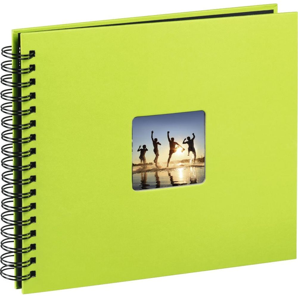 Limonkowo-zielona okładka albumu na zdjęcia z kwadratowym wycięciem pokazującym cztery sylwetki skaczących osób.