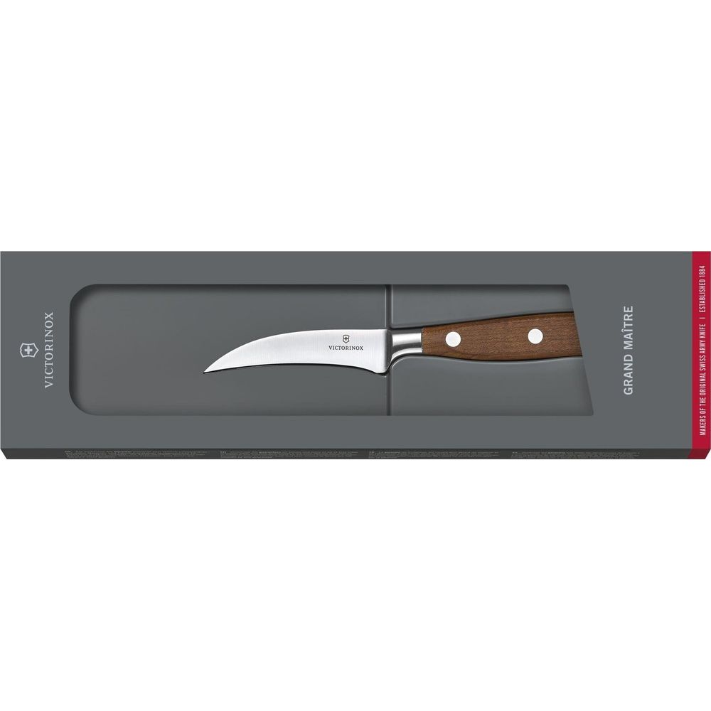 Ein Victorinox Kochmesser mit Holzgriff in einer dunkelgrauen Verpackung.