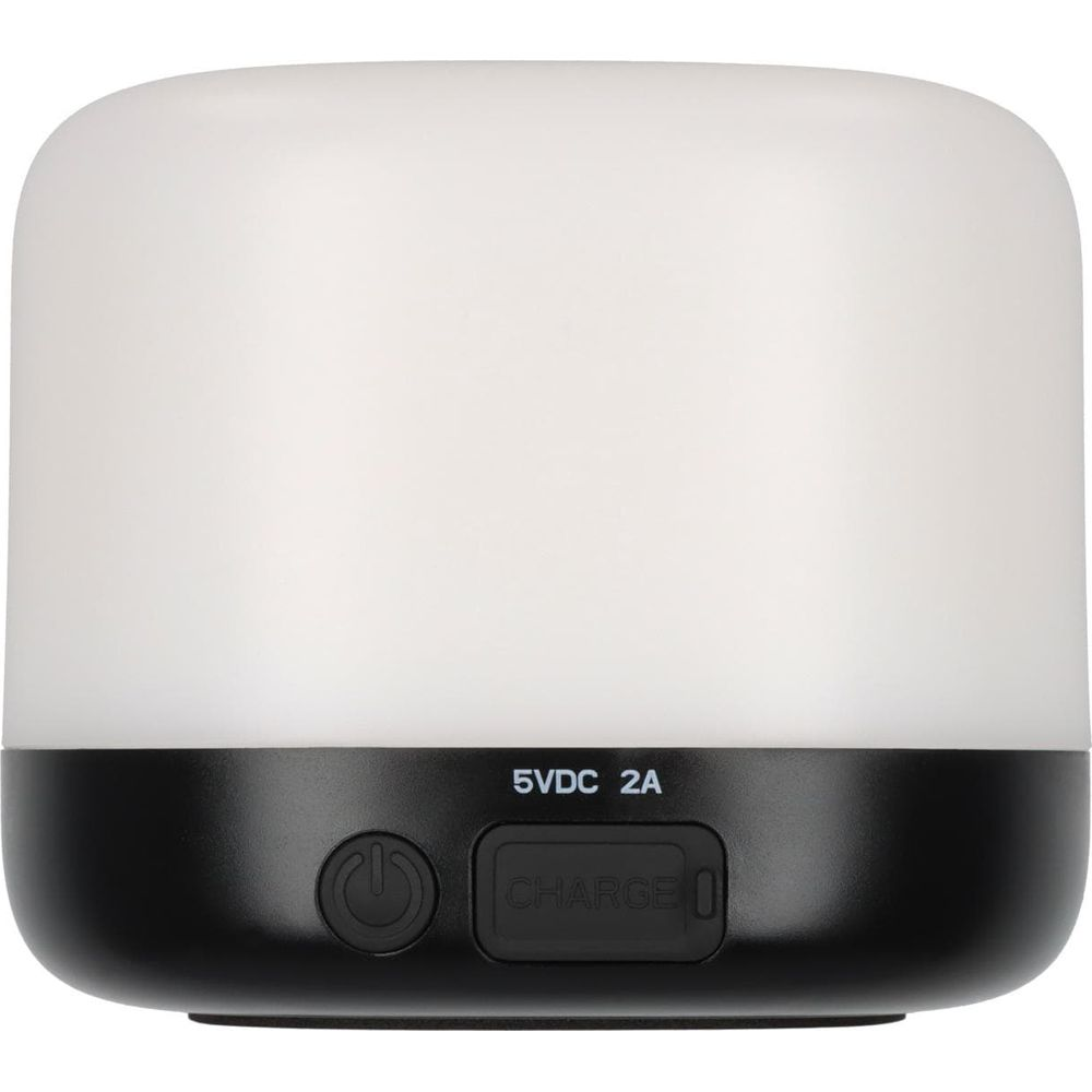 Biała lampa z czarną podstawą. Widoczny przycisk zasilania i wskaźnik ładowania.