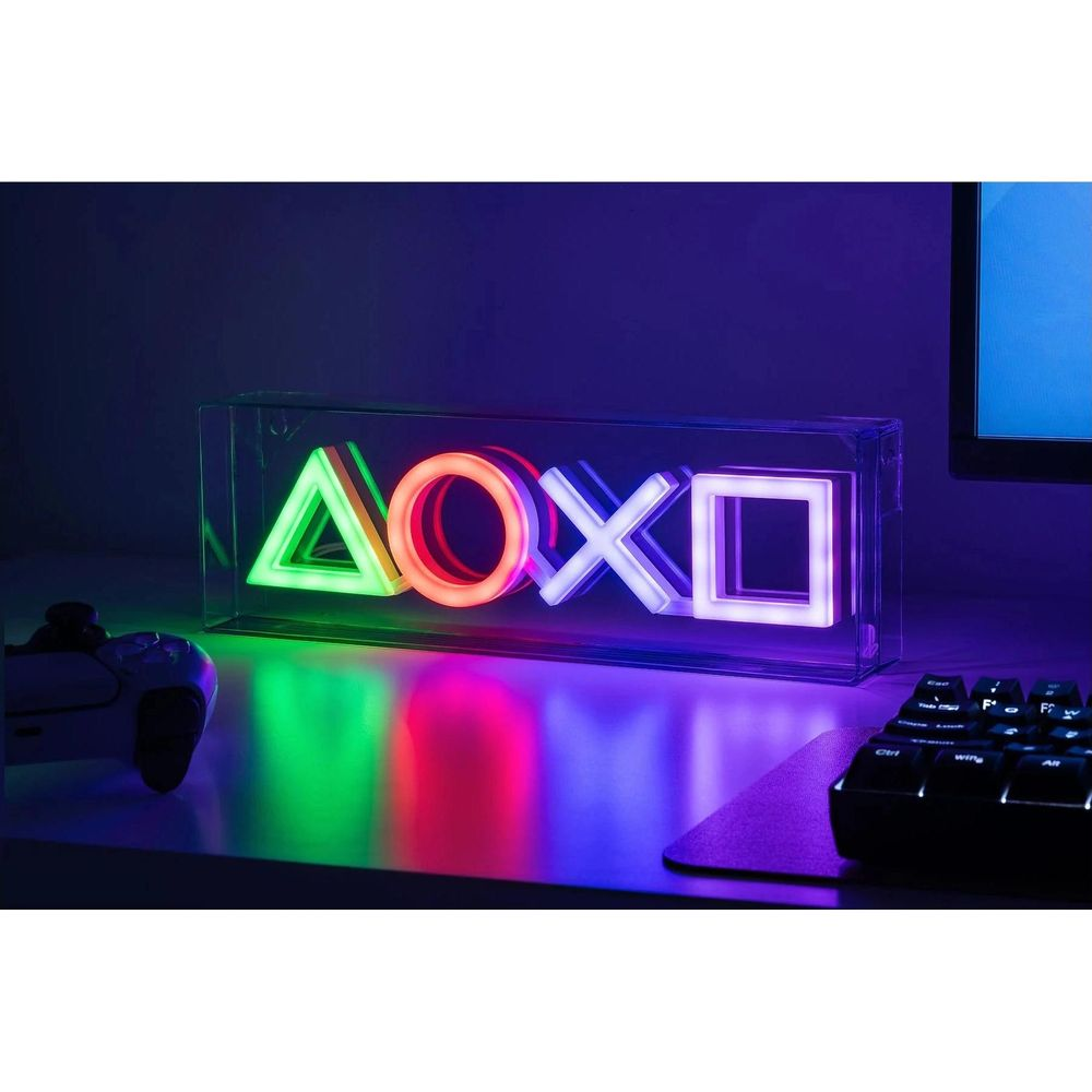 Neonowe symbole Playstation trójkąt, koło, krzyżyk, kwadrat w pudełku.