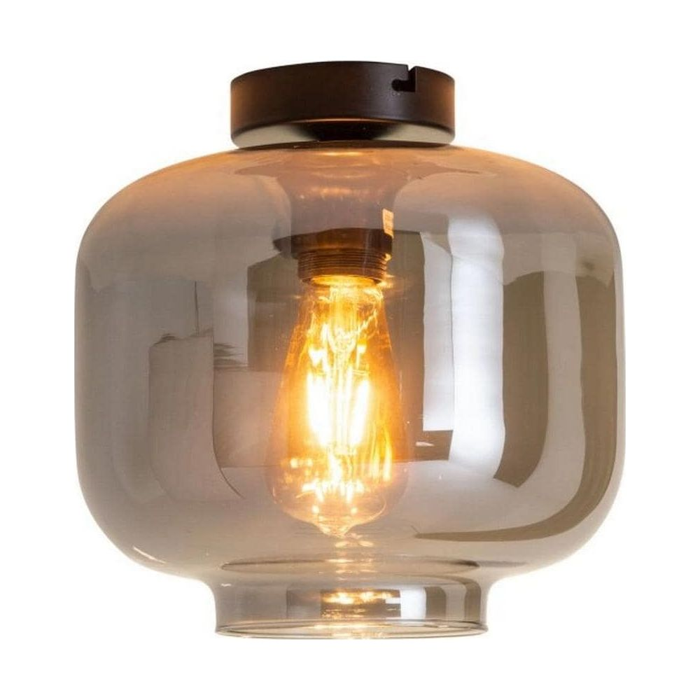 Plafonnier avec abat-jour en verre gris fumé et ampoule Edison visible.