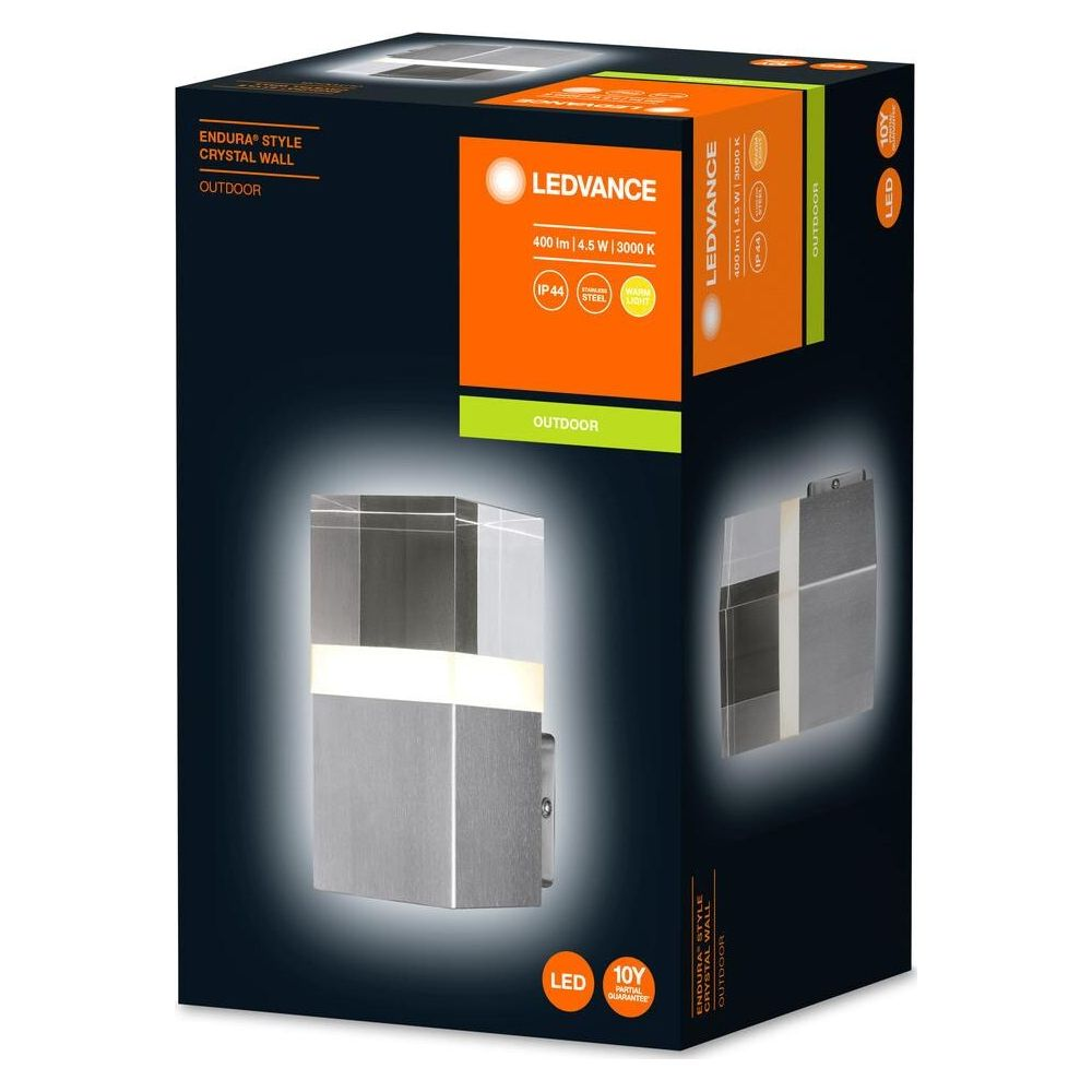 Verpackung einer LED-Wandleuchte, silberfarben, mit Glasdetails.