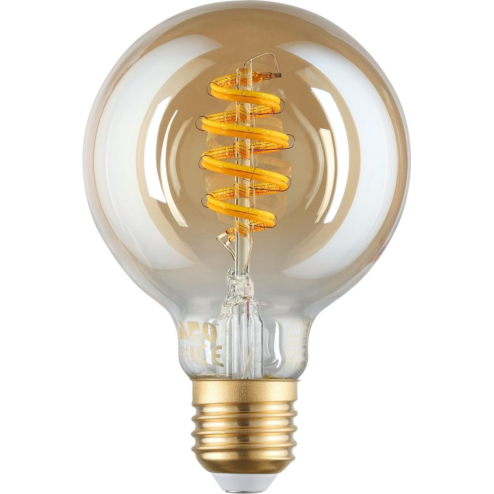 Una lampadina color ambra con un filamento a spirale all'interno.