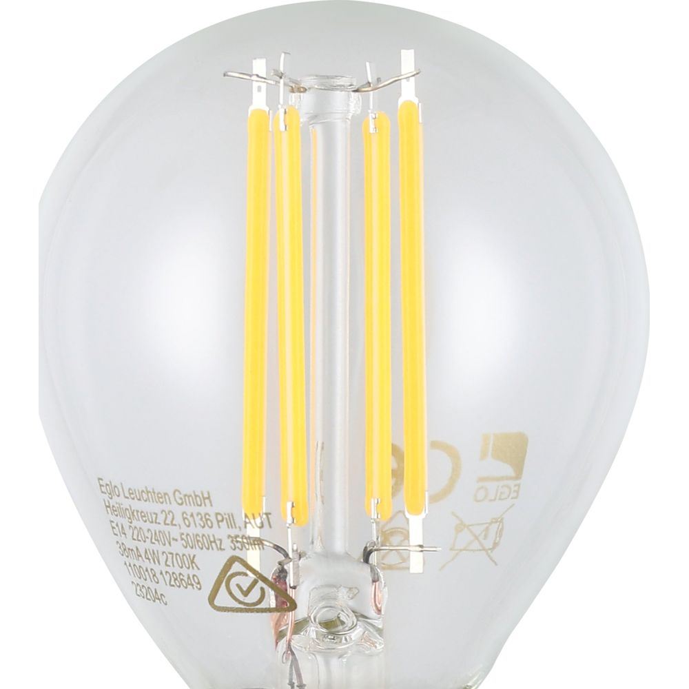 Gros plan d'une ampoule LED avec filaments jaunes et détails techniques.