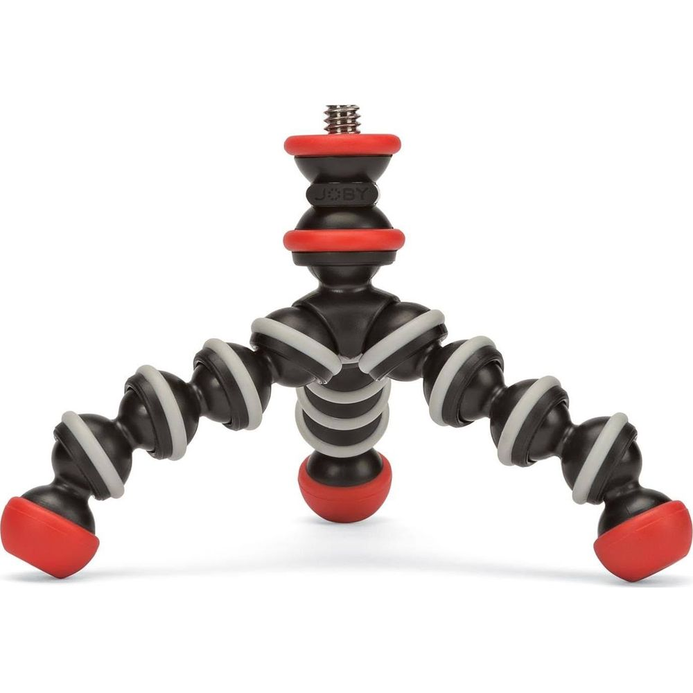 A black flexible Gorillapod tripod with red feet and rings.