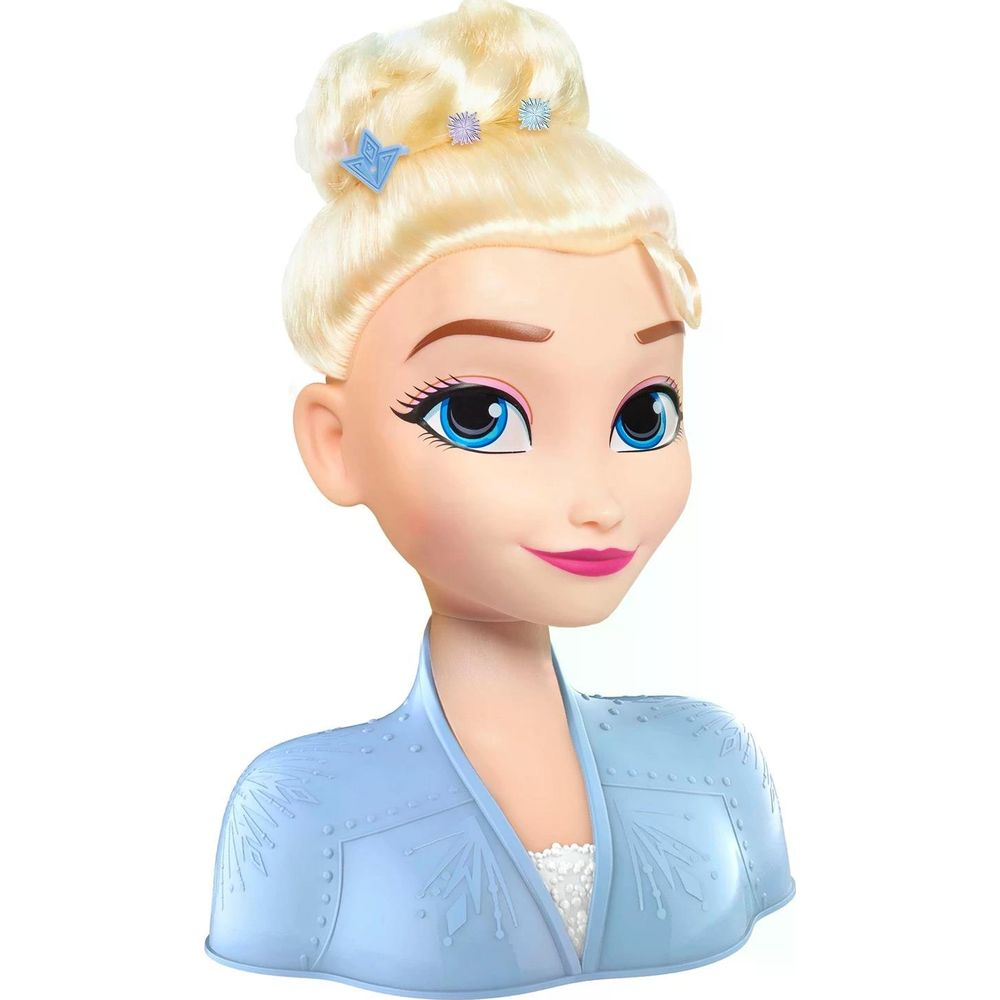 Una bambola di Elsa con capelli biondi, occhi blu e vestito blu.