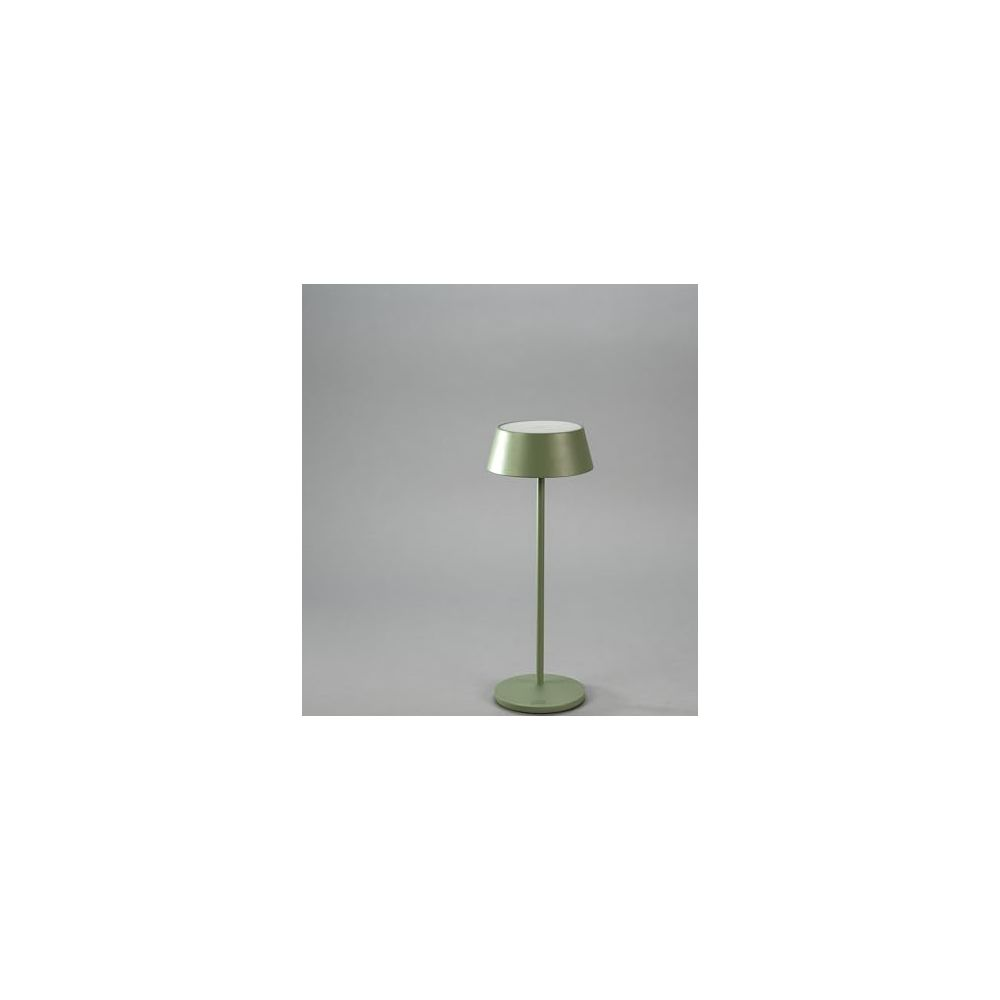 Eine grüne Schreibtischlampe mit einem runden Fuß und einem kegelförmigen Schirm.