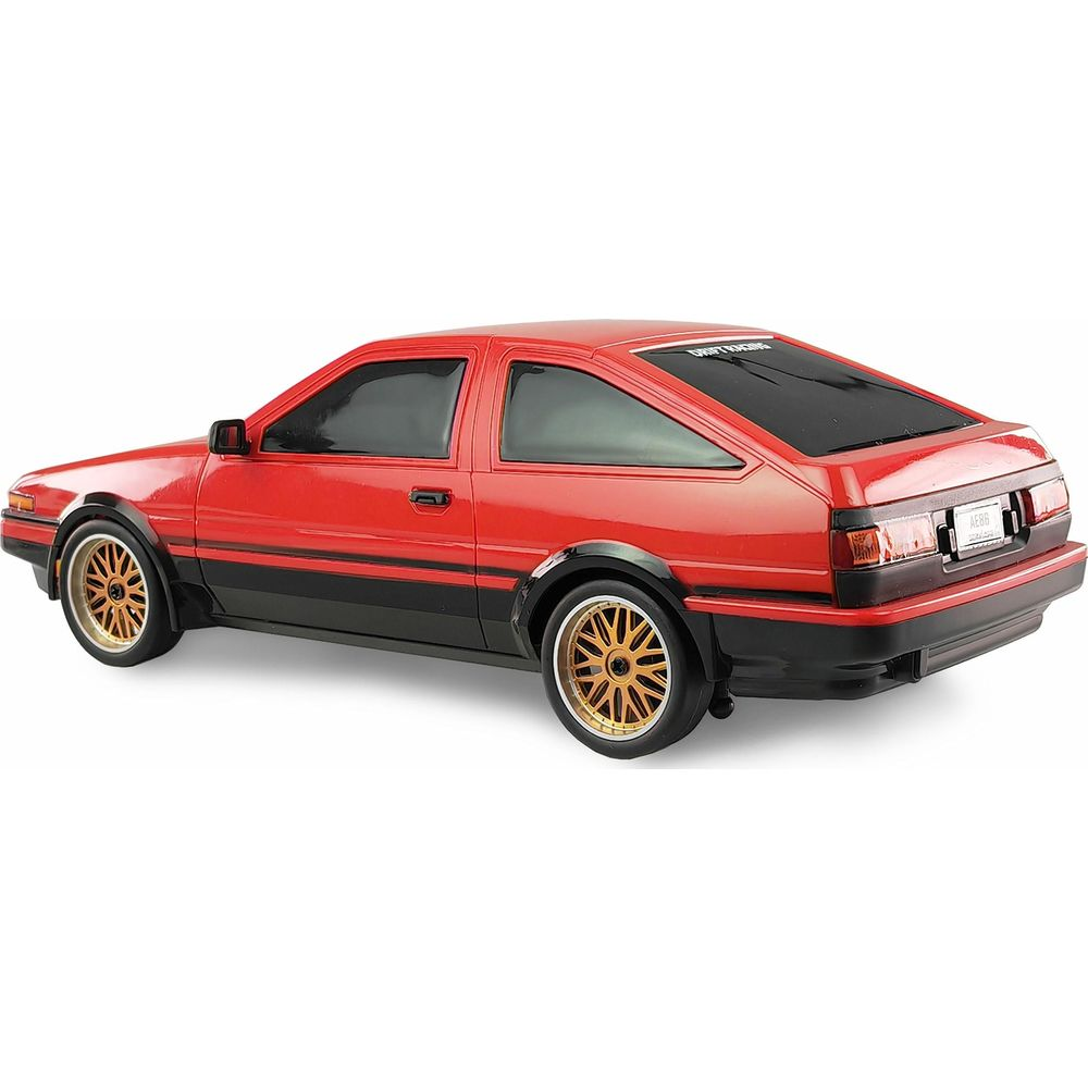 Ein rotes Modellauto mit schwarzen Streifen und goldenen Felgen.