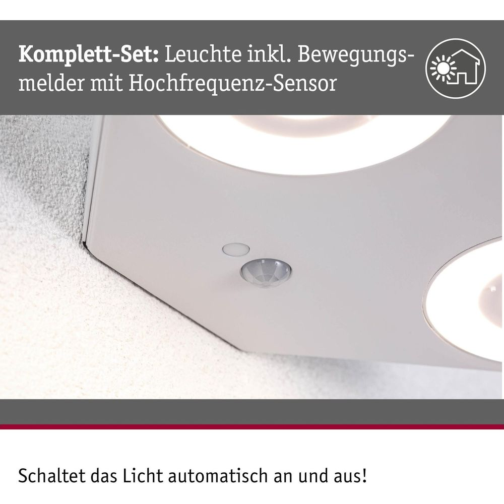Biała lampa sufitowa z czujnikiem ruchu i dwoma źródłami światła.