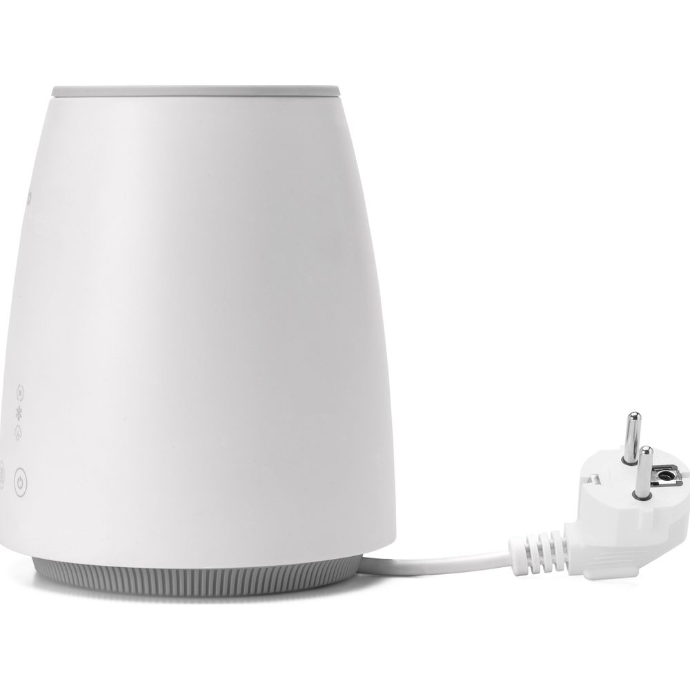 Ein weißer, zylindrischer Diffusor mit einem grauen Boden und einem Stecker.