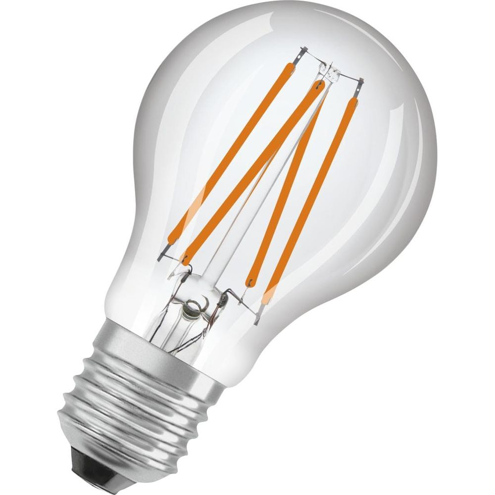 Une ampoule transparente avec des filaments oranges sur fond blanc.