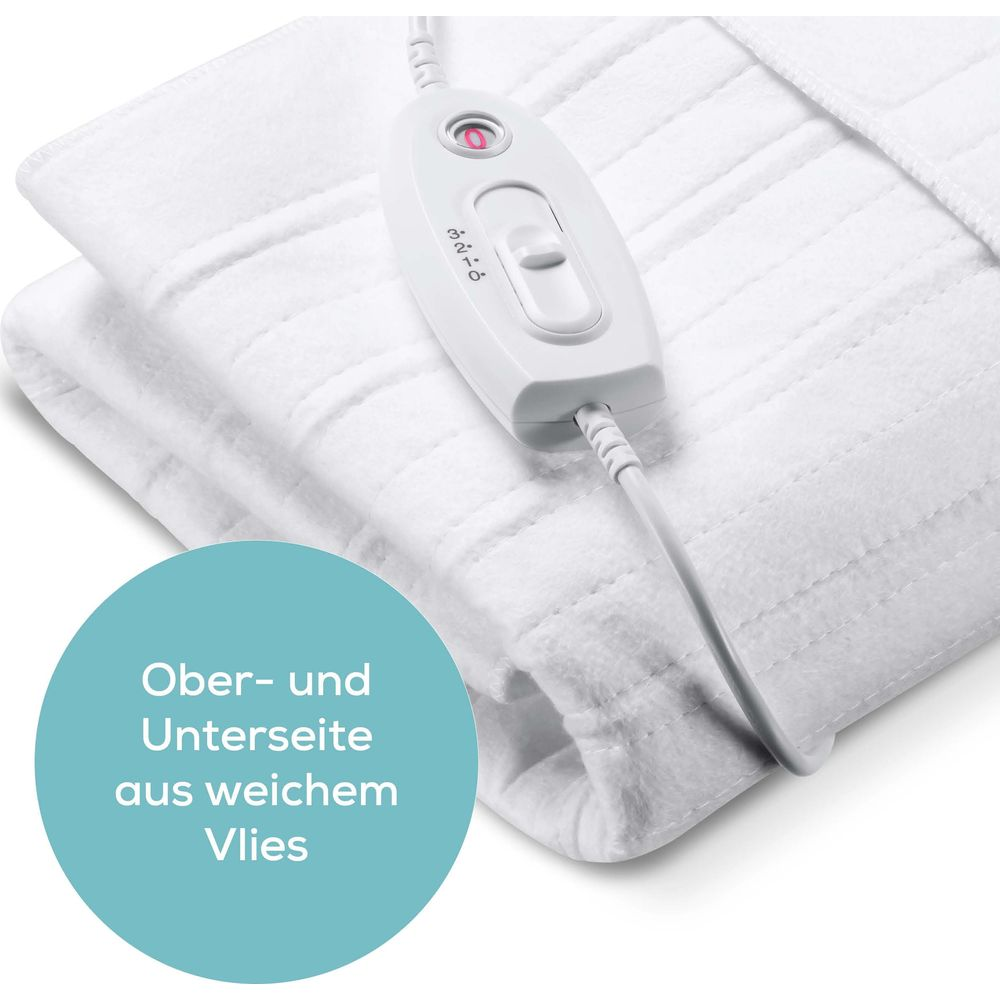 Ein weißes Heizkissen mit weißem Regler und Kabel, nahaufnahme.