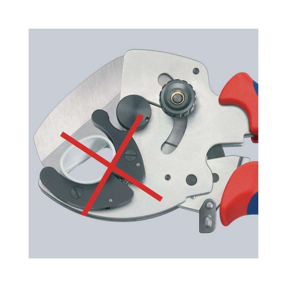 Close-up of pruning shears mechanism with red cross.