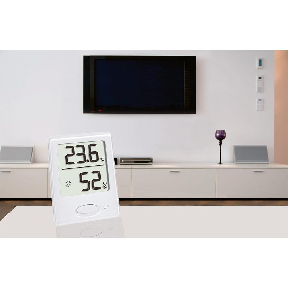 Ein digitaler Thermometer/Hygrometer zeigt 23,6°C und 52% RH an.