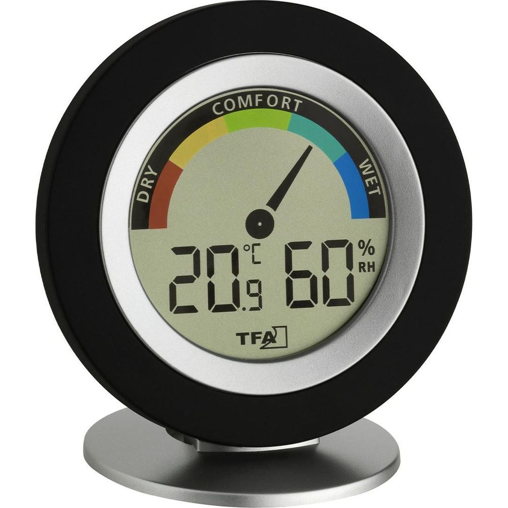 Ein TFA-Hygrometer zeigt 20.9°C und 60% RH an, mit Pfeil im Komfortbereich.
