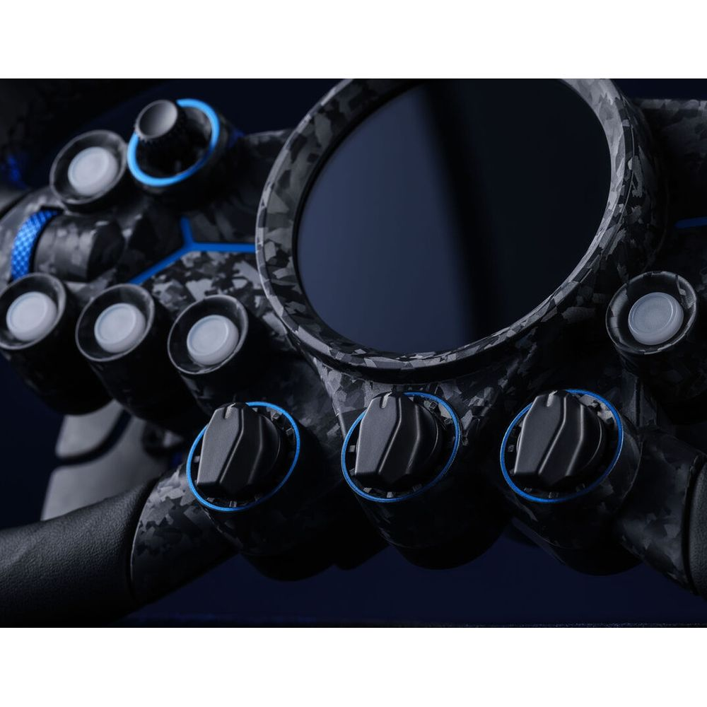 Gros plan d'une console noire avec des accents bleus et des boutons.