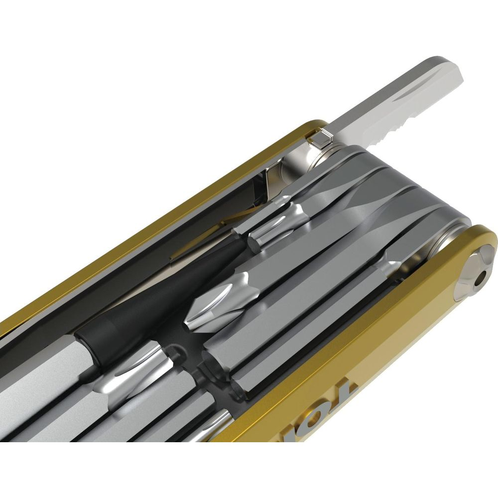Narzędzie wielofunkcyjne z różnymi bitami, częściowo wysunięte, w złotej obudowie.