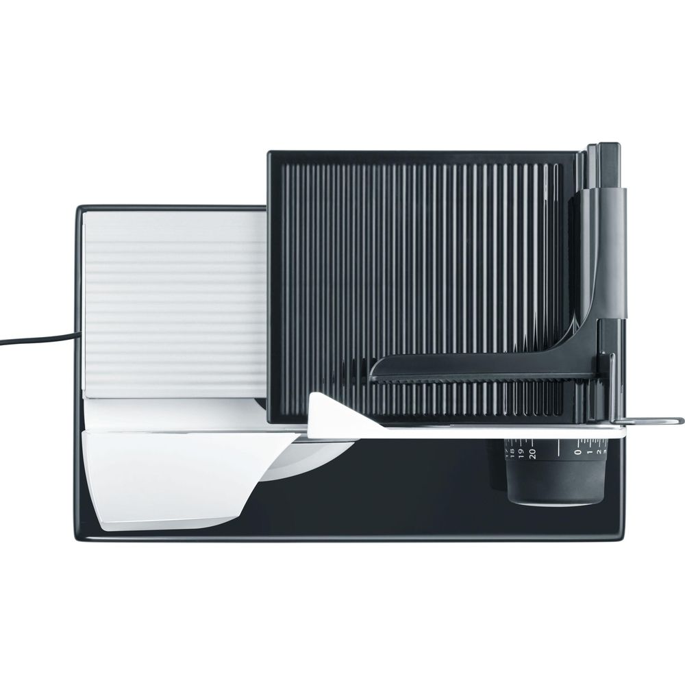 Czarna elektryczna krajalnica z białym pojemnikiem i korbą.