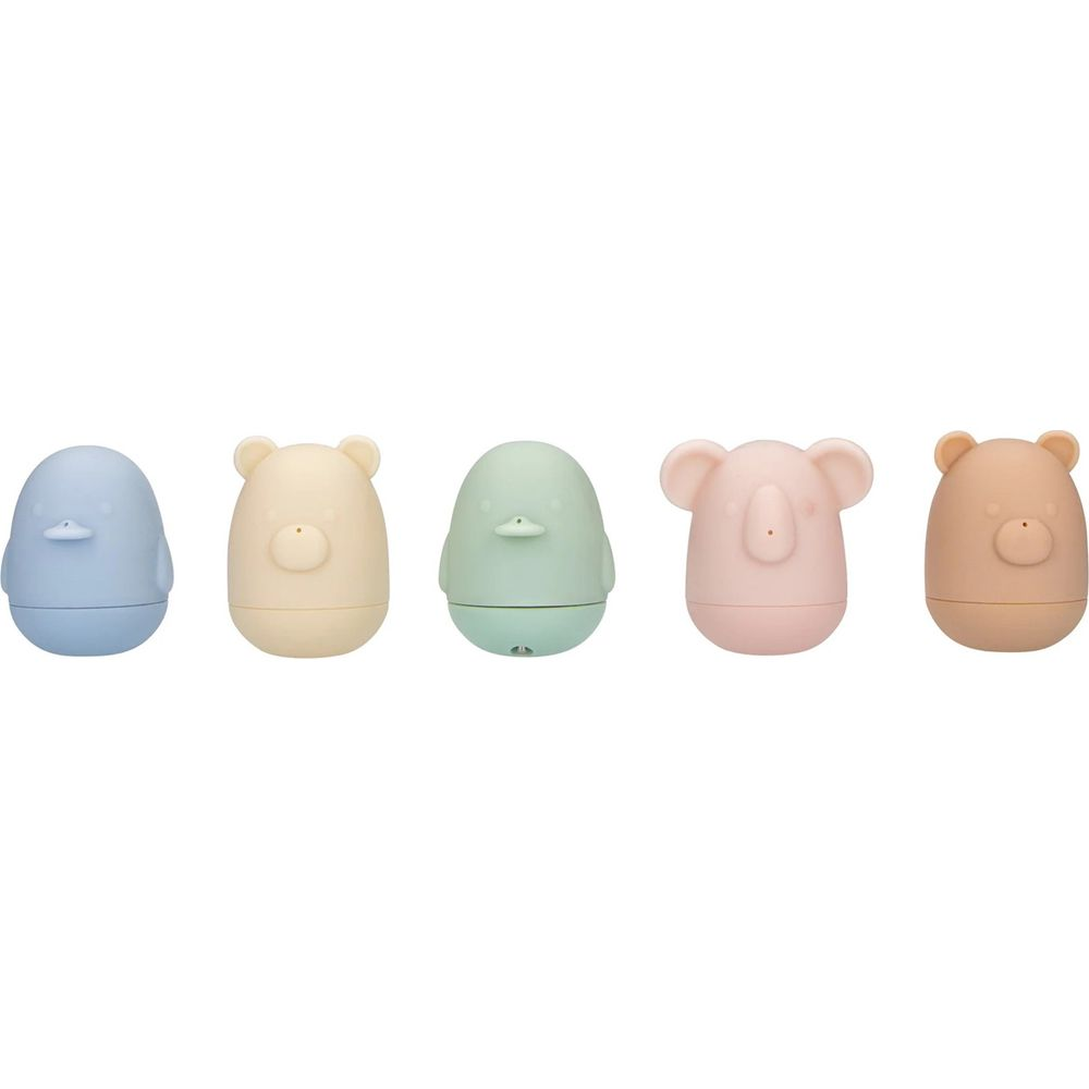 Fünf bunte Tierfiguren aus Gummi, nebeneinander aufgereiht.