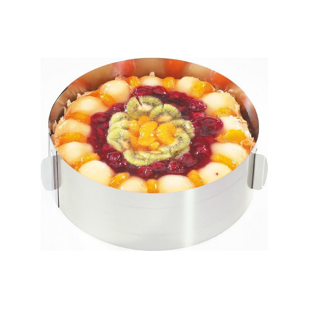 Gâteau aux fruits avec kiwi, mandarine et cerises dans un cercle.