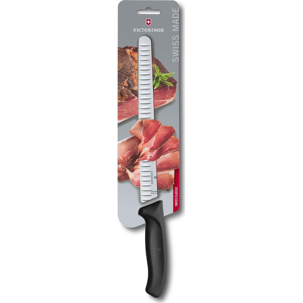 Victorinox Messer mit schwarzem Griff und weißer Klinge auf Verpackung mit Schinkenbild.