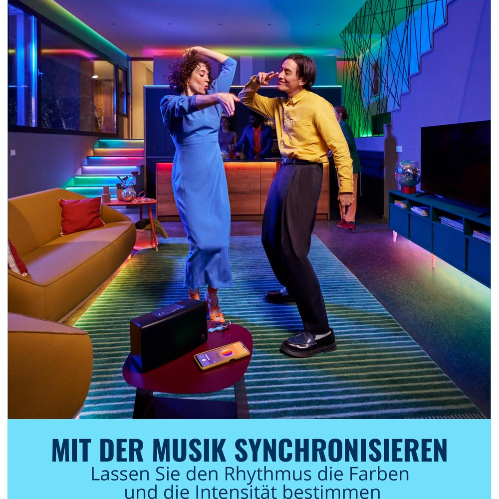 A couple dances in a room with colorful lights synchronized to music.