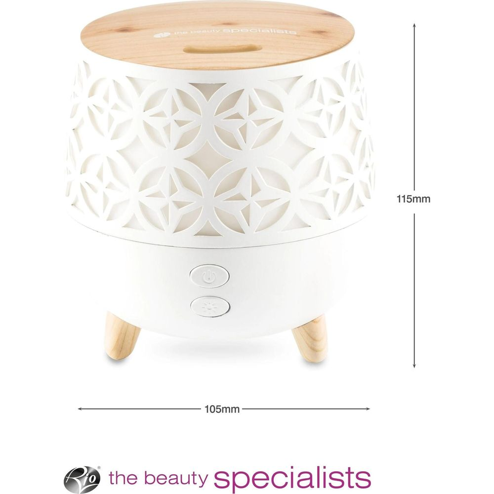 Diffusore bianco con coperchio in legno, motivo geometrico e tre gambe.