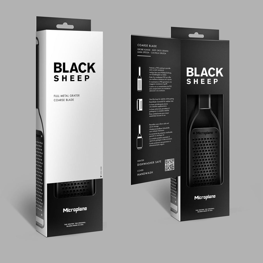 Schwarzes Schaf Vollmetall-Reibe und Verpackung mit Produktinformationen.
