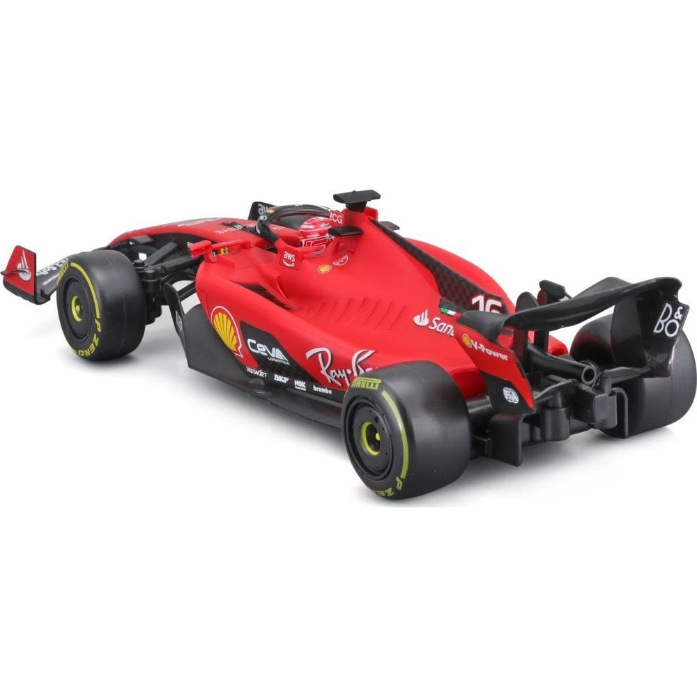 Ein rotes Formel-1-Auto mit schwarzen Flügeln und gelben Reifen auf weißem Hintergrund.