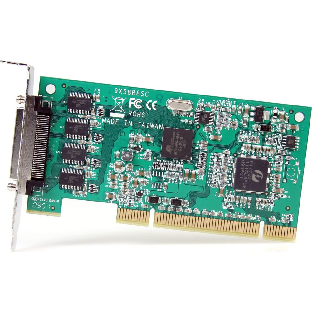 Una scheda di espansione per computer verde con chip, connettori ed etichettatura.