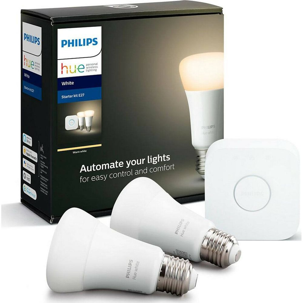 Zestaw startowy Philips Hue z dwoma białymi żarówkami i mostkiem na czarnym opakowaniu.