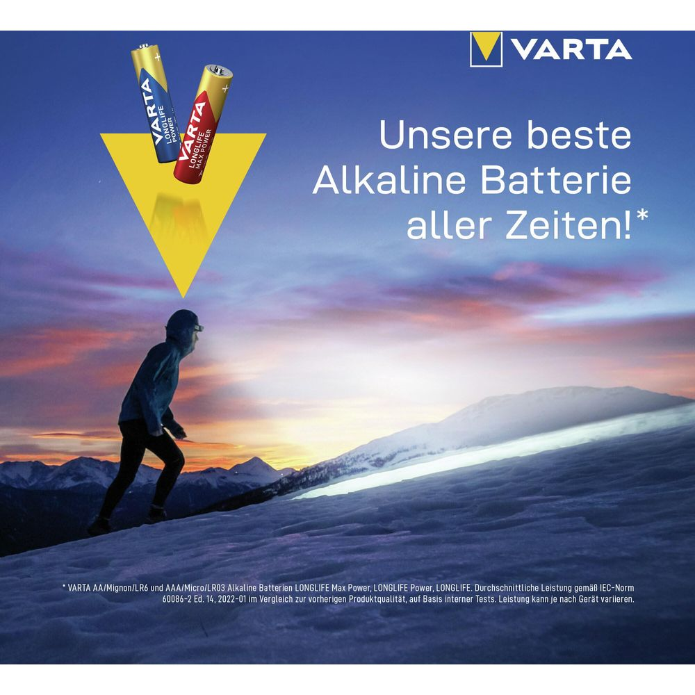 Een hardloper op een besneeuwde helling; Varta-batterijen zweven erboven.
