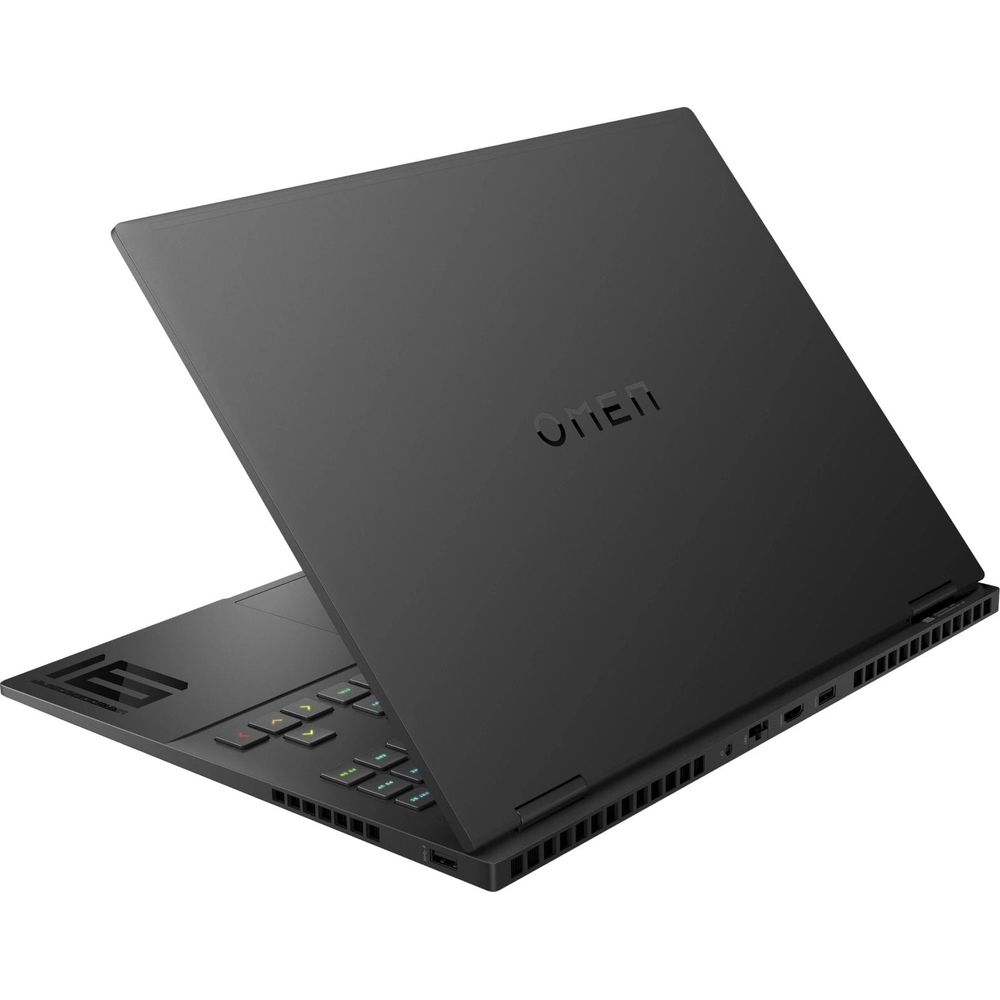 Laptop nero con tastiera illuminata e logo "OMEN" sul coperchio.