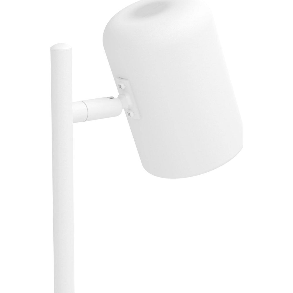 Eine weiße Lampe mit zylindrischem Lampenschirm auf einem Ständer.