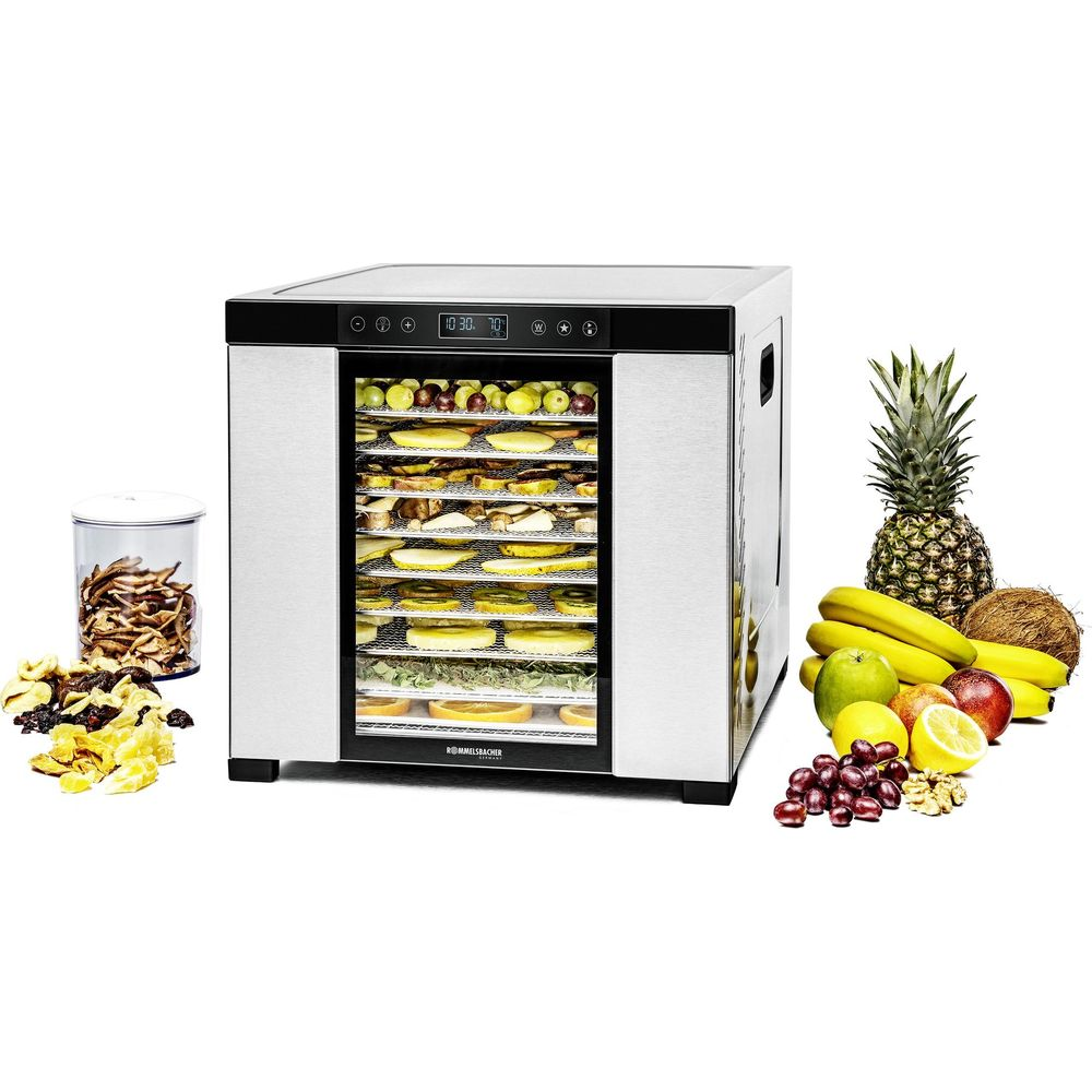 Un déshydrateur alimentaire avec des fruits et des fruits secs. Plusieurs étagères de nourriture sont visibles à l'intérieur.