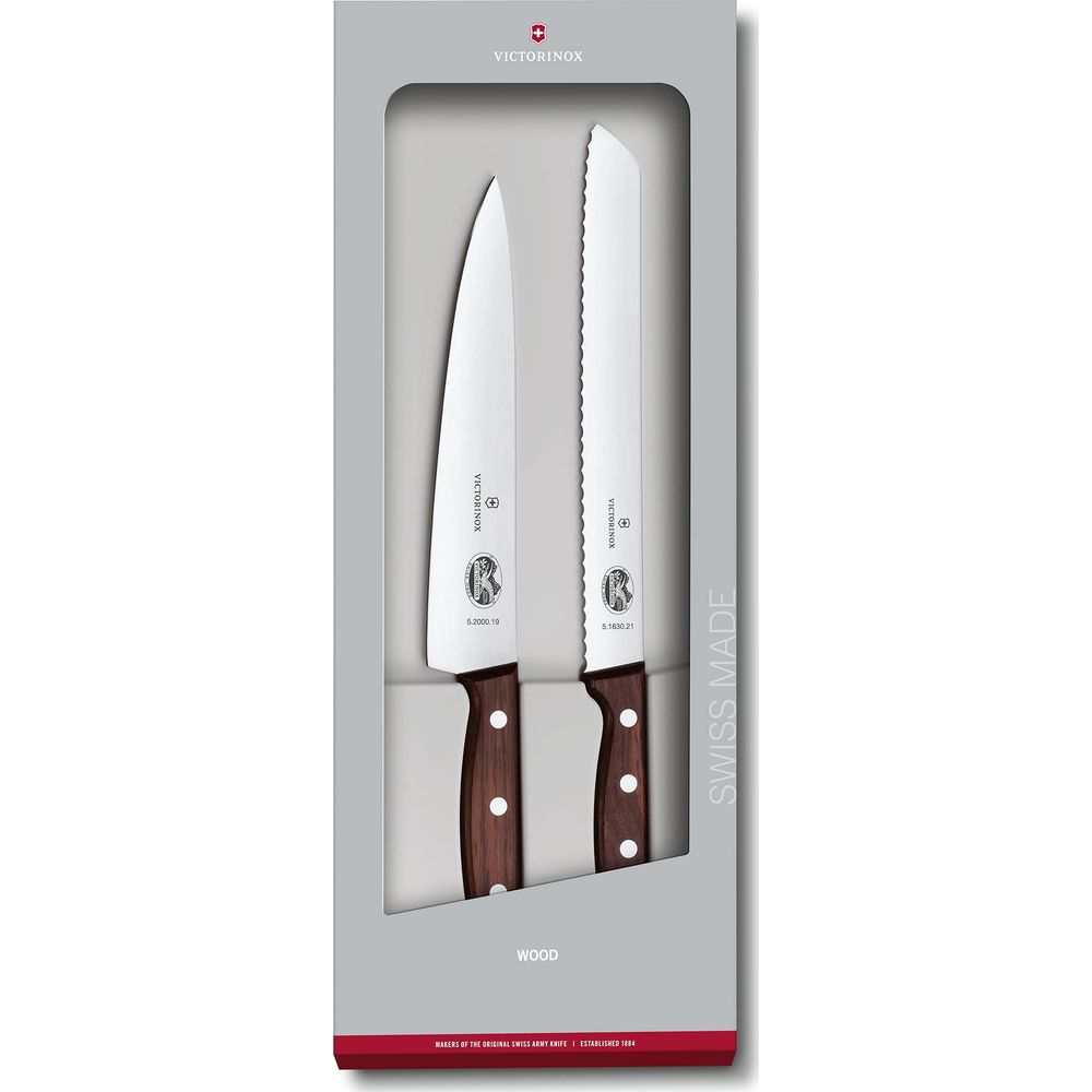 Zwei Victorinox Messer mit Holzgriffen in einer Verpackung.