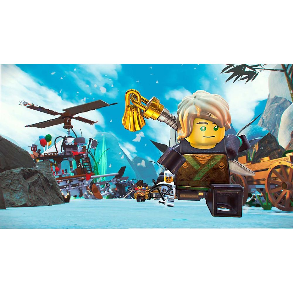 Un personnage Lego aux cheveux argentés tient une cloche dorée, devant un hélicoptère.