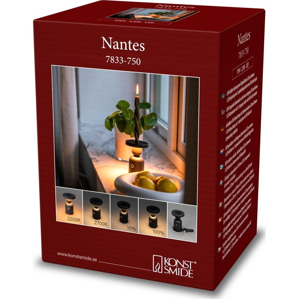 Nantes Lampe: Kerze, Früchte, Fensterbank, verschiedene Helligkeitsstufen.