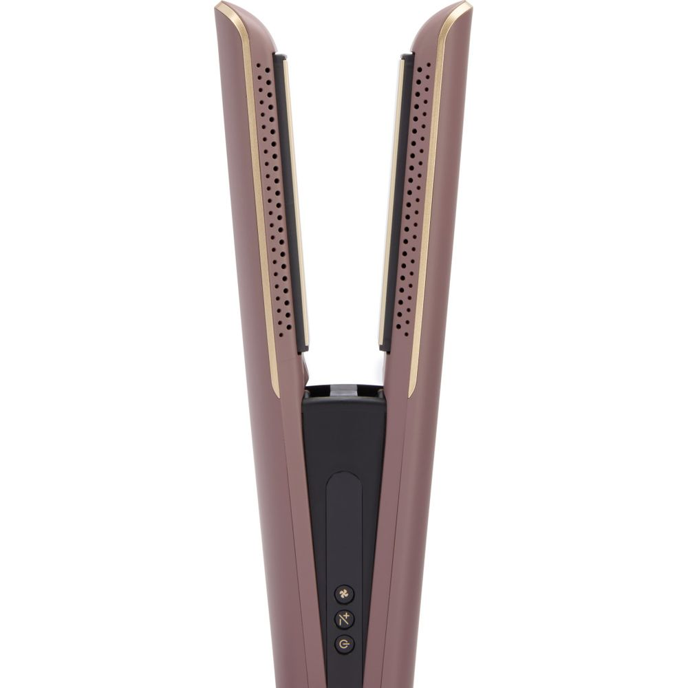 Una piastra per capelli color oro rosa con piastre nere e finiture dorate.
