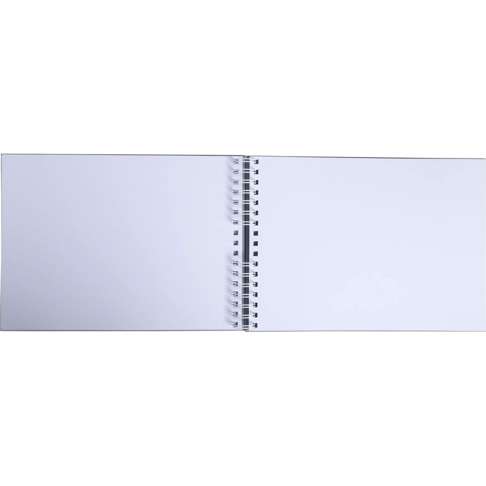 Un cuaderno abierto con páginas blancas y encuadernación en espiral plateada.