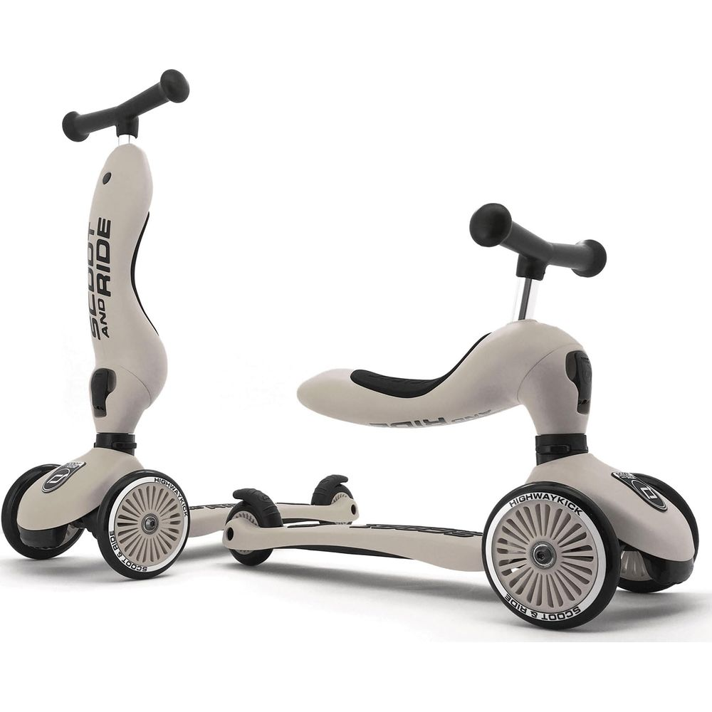 Un trotteur beige avec siège et trois roues, exposé sur fond blanc.