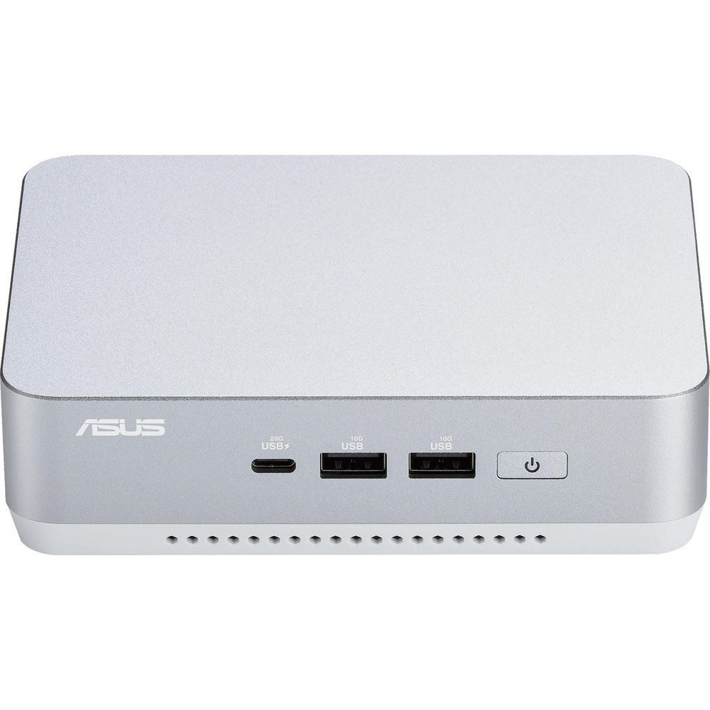 Silver ASUS mini PC with USB ports and power button.
