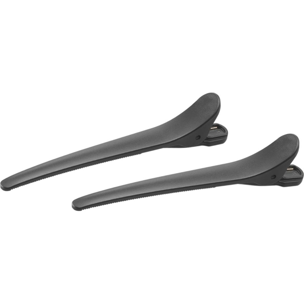 Dwa czarne klipsy do włosów leżą obok siebie na białym tle.