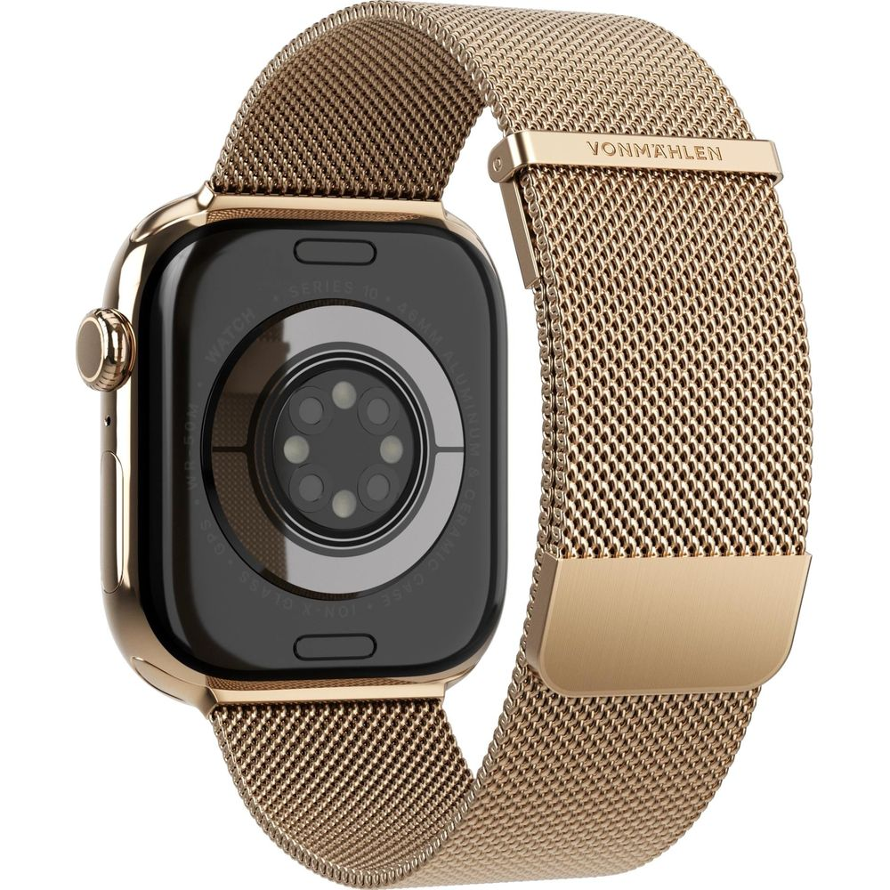 Montre connectée dorée avec bracelet milanais, dos montrant les capteurs.