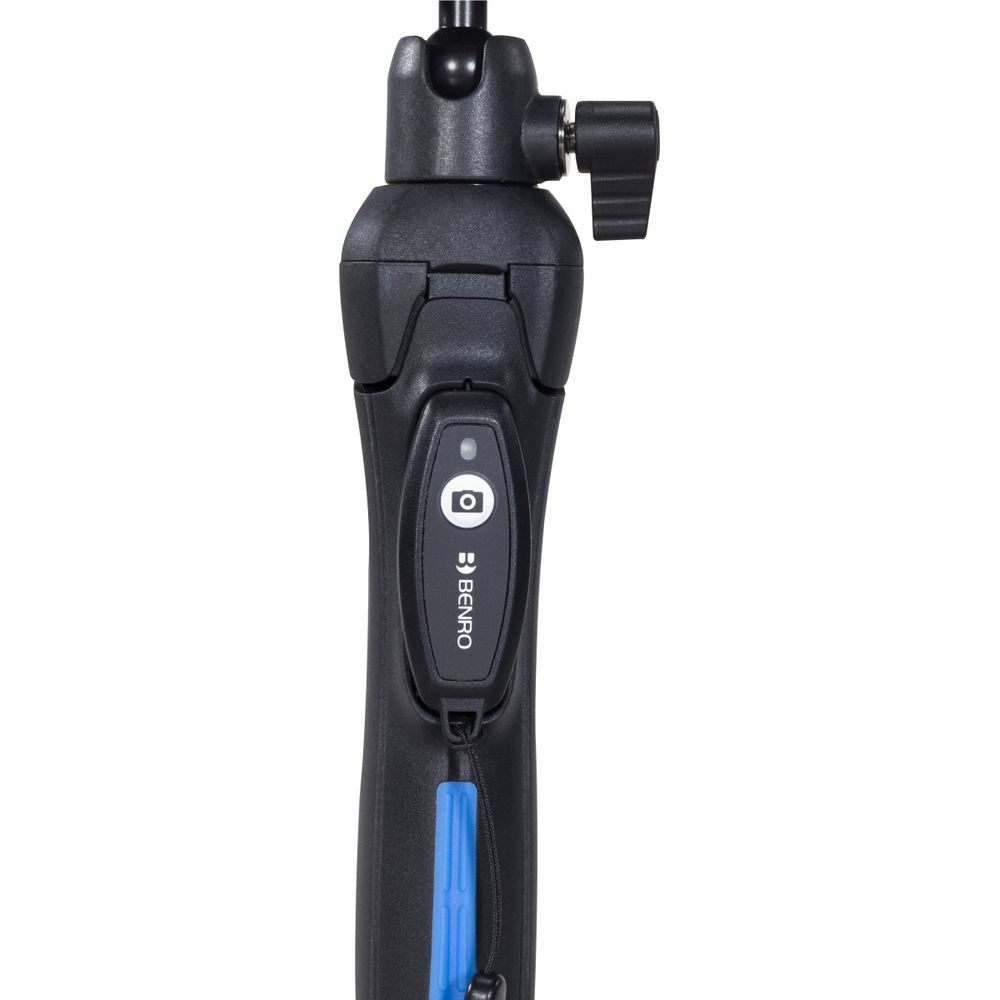 Close-up of a black camera tripod handle with Benro logo and shutter button.