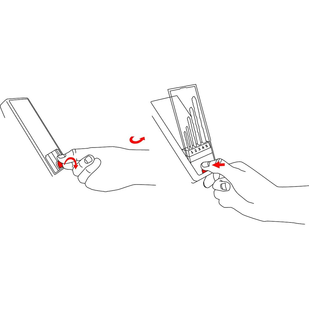 Mains insèrent une cassette dans un appareil et tournent un interrupteur.