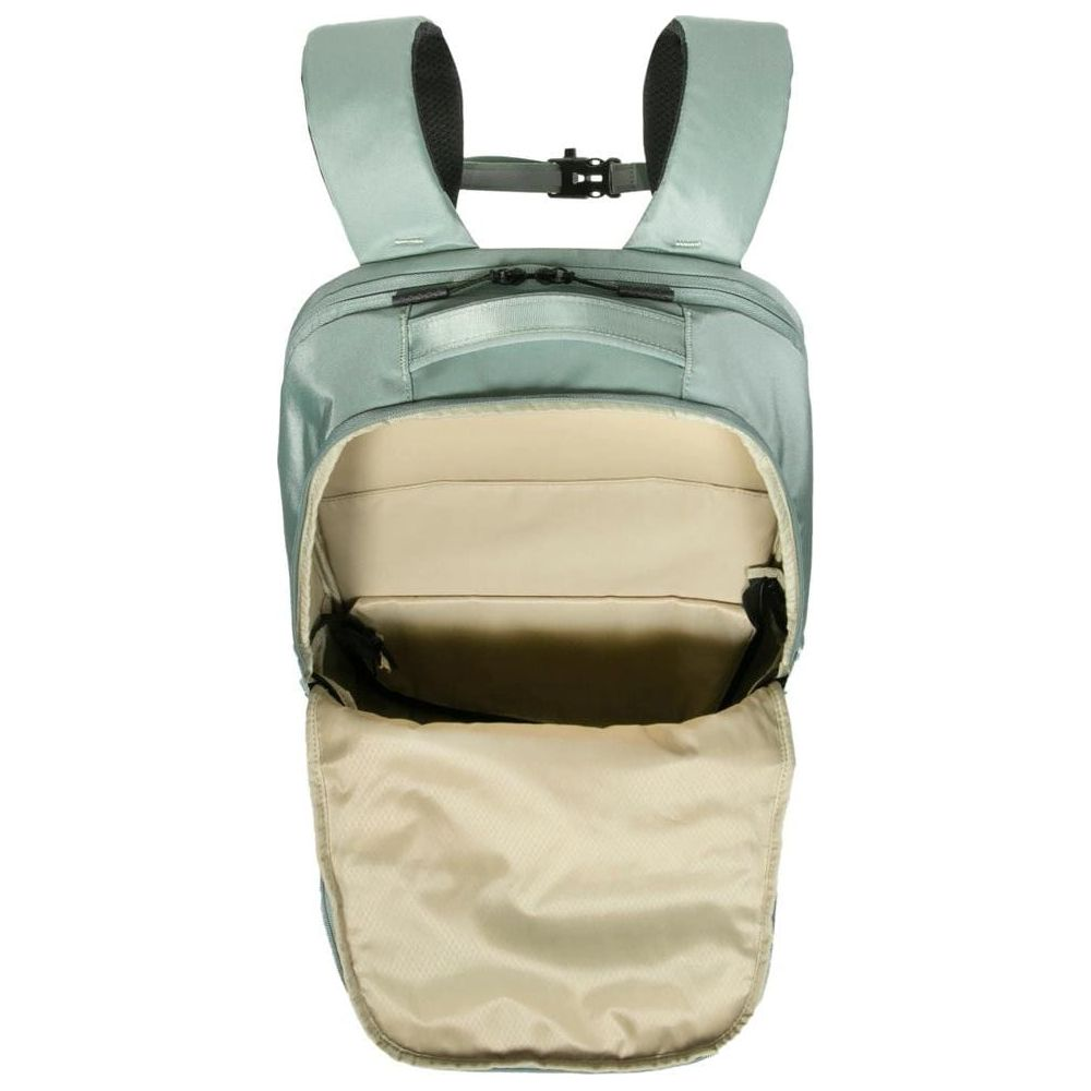 Uno zaino verde chiaro con lo scomparto principale aperto, che mostra un interno beige chiaro.