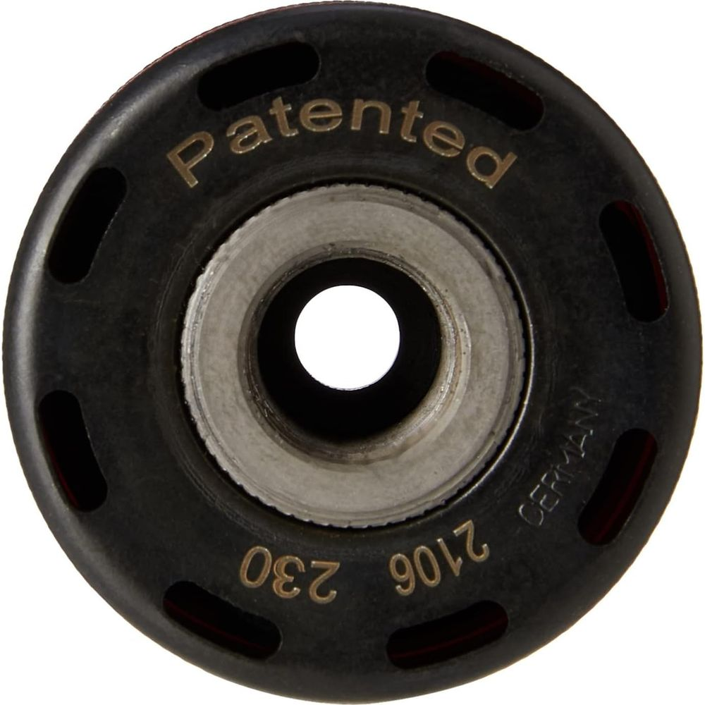 Schwarzes Objekt mit silbernem Mittelteil, Text 'Patented' und 'Germany'.