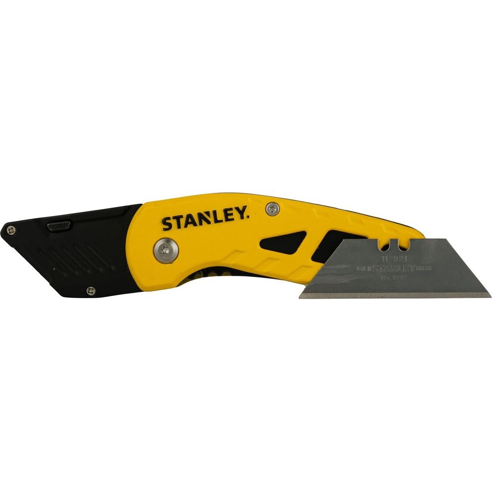 Ein gelber Stanley-Cutter mit ausgefahrener Klinge und schwarzem Griff.