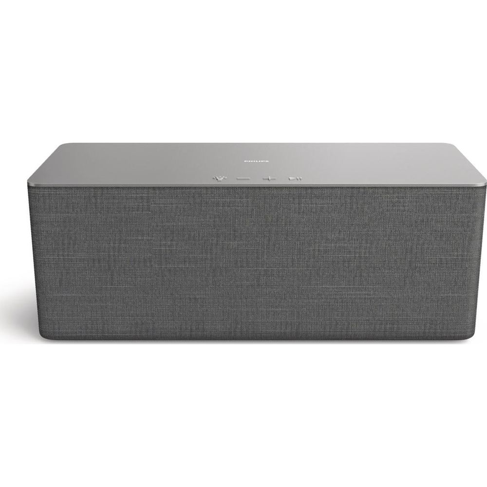 Haut-parleur gris avec grille en tissu et dessus argenté.